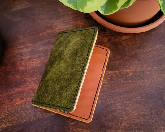 Moss green and saddle tan vertical leather bifold wallet